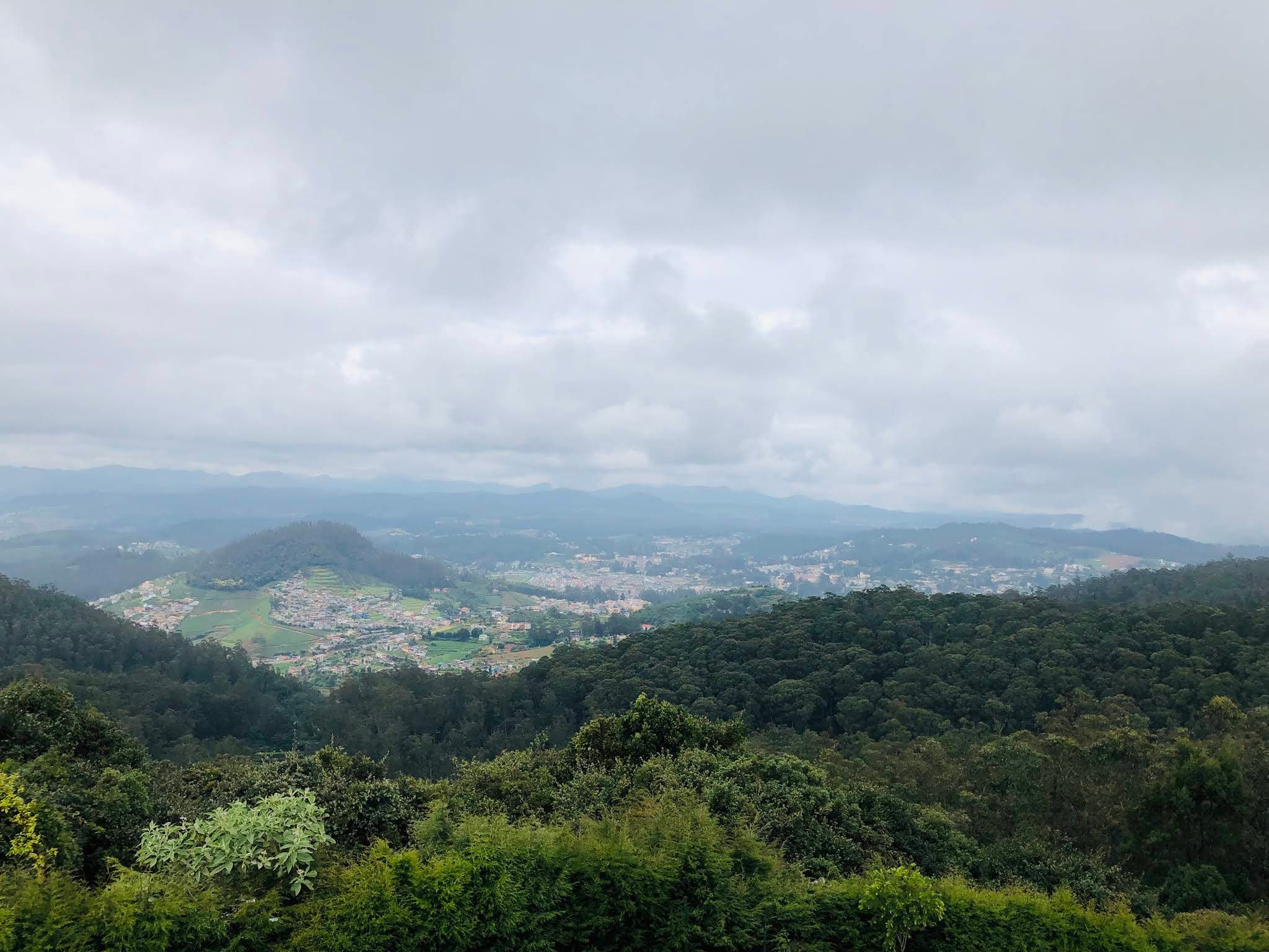 Panoramic mountain view from Doddabetta Peak at sunset