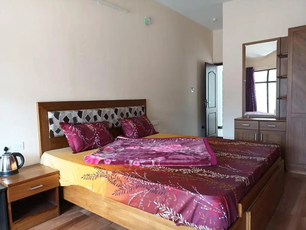 Deluxe Room at Karpagam Residency Ooty with Mountain View - Best Hotels in Ooty