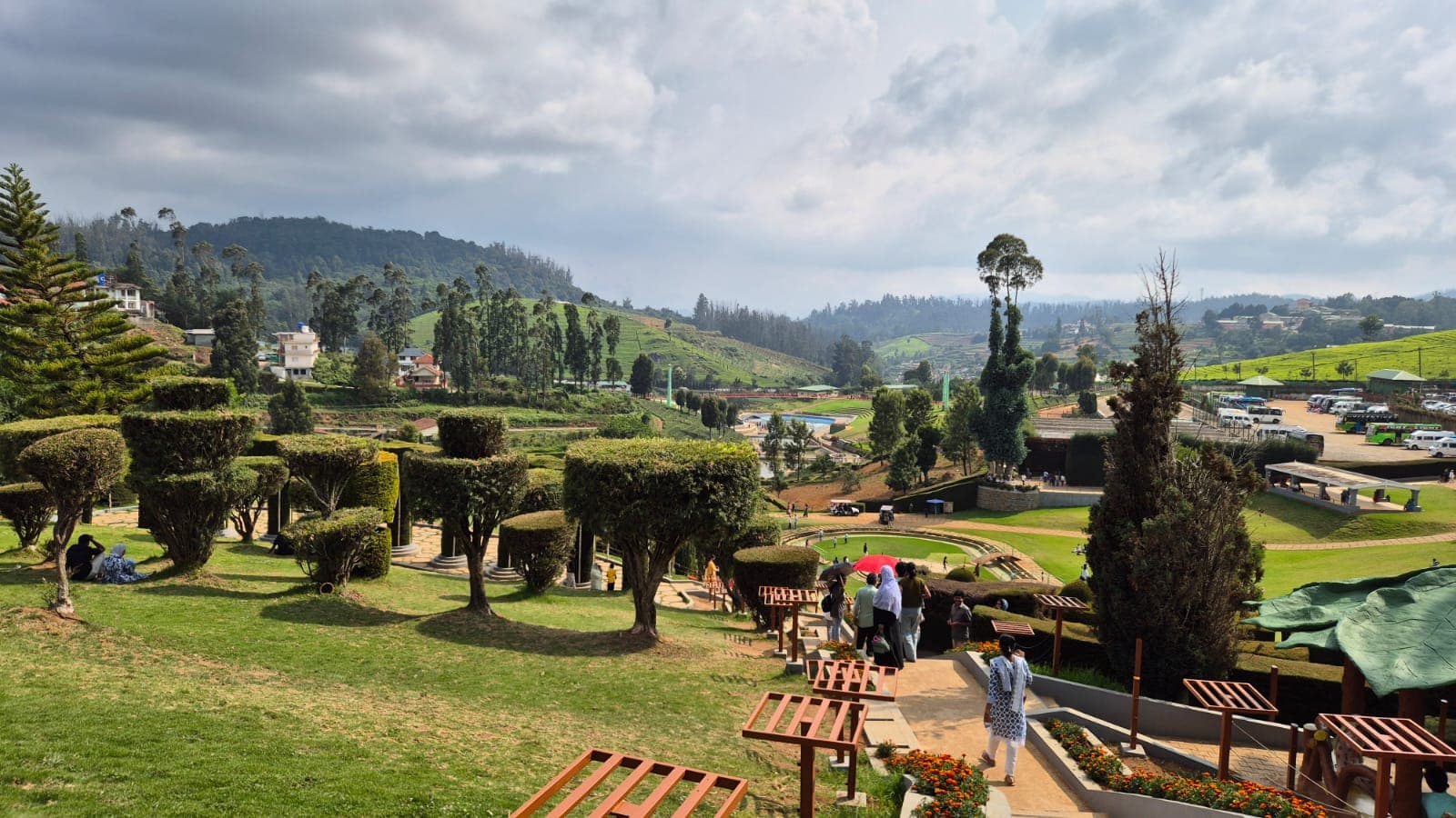 Vibrant themed garden sections at Karnataka Siri Horticulture Garden Ooty with colourful flowering pots
